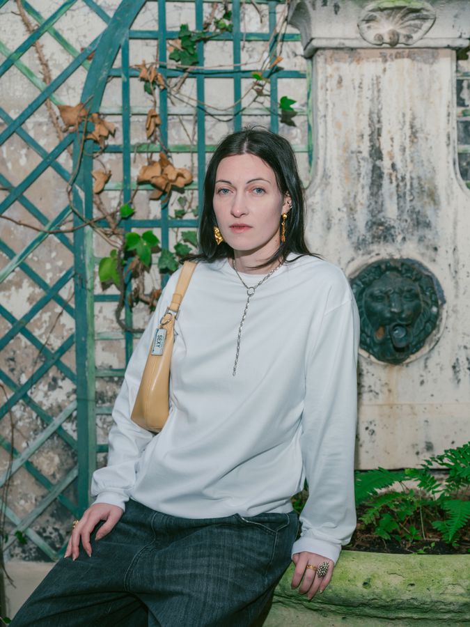 Seated portrait in a garden
