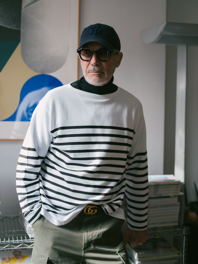 Artist in breton stripes in his studio