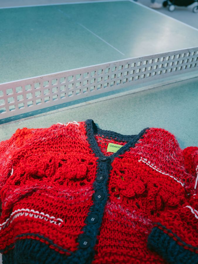 Red hand-knit cardigan