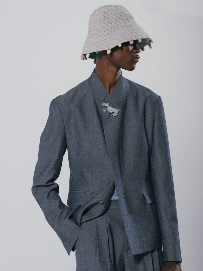 Grey suit and white bucket hat
