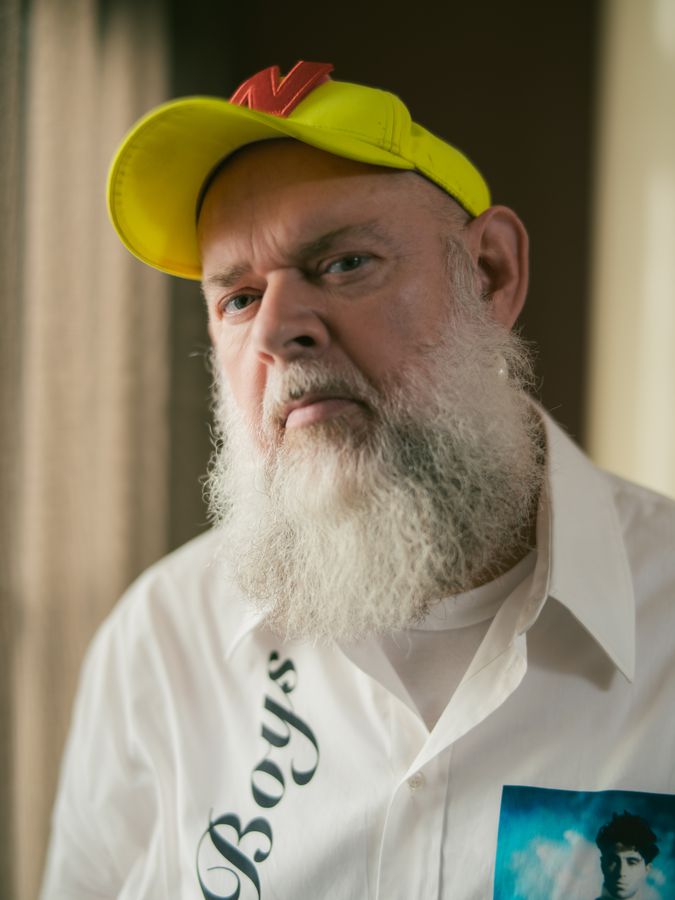 Bearded man in a yellow cap