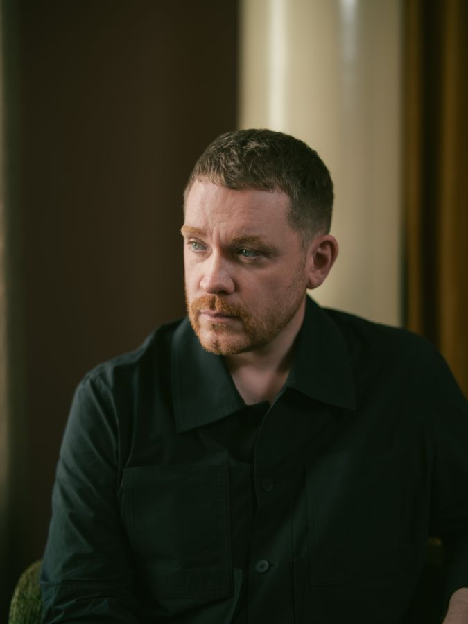 Seated portrait in black