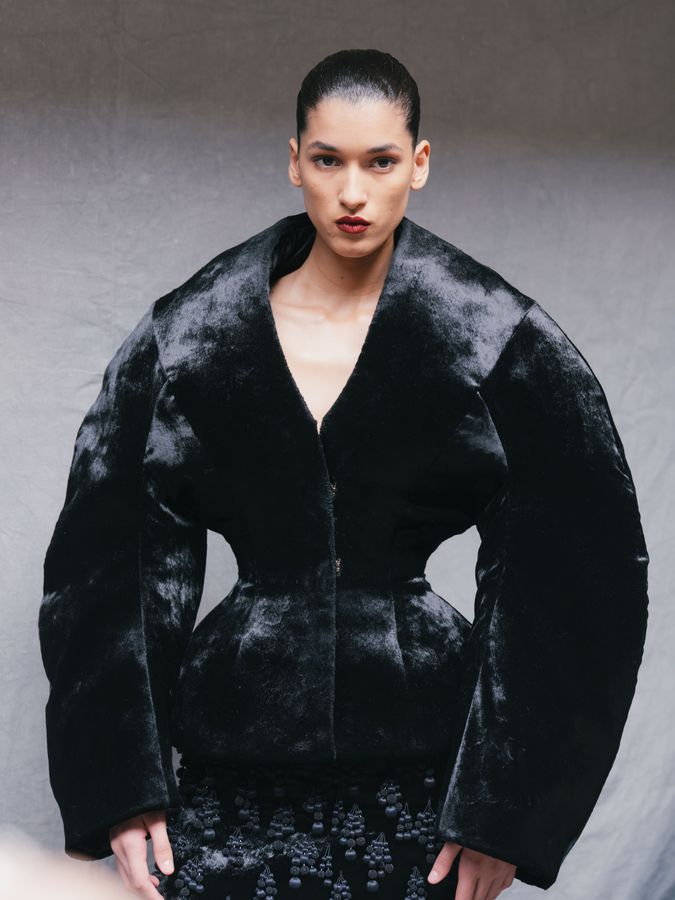 Sculptural black velvet jacket